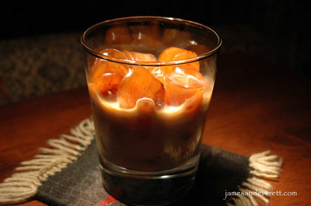 Baileys over coffee ice cubes