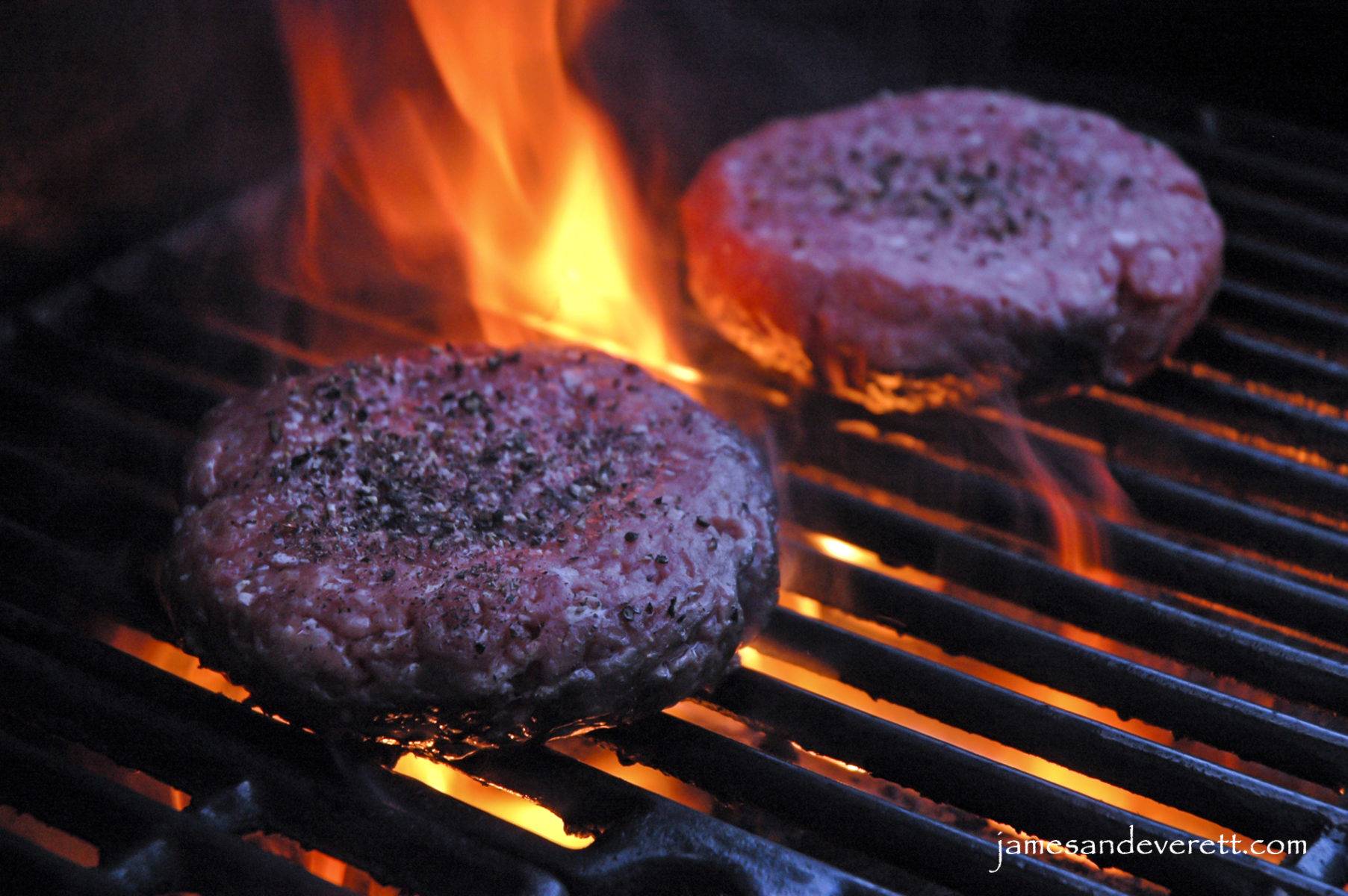 Flame broiled burgers on the grill