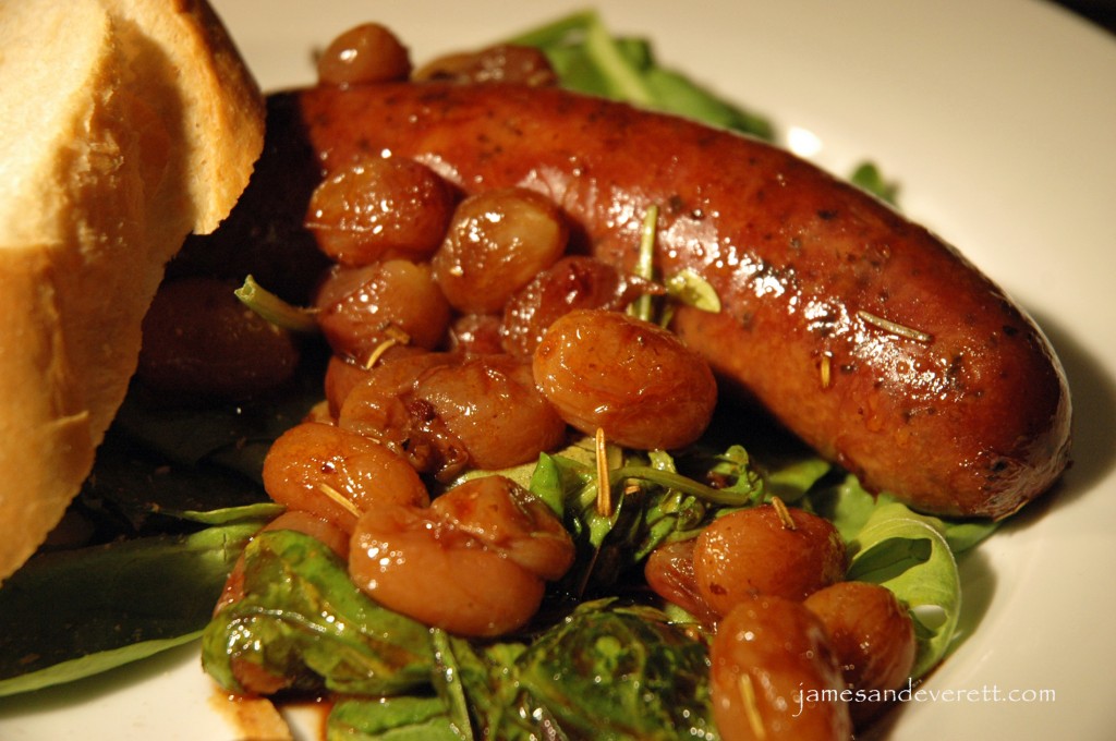 Roasted sausages and grapes